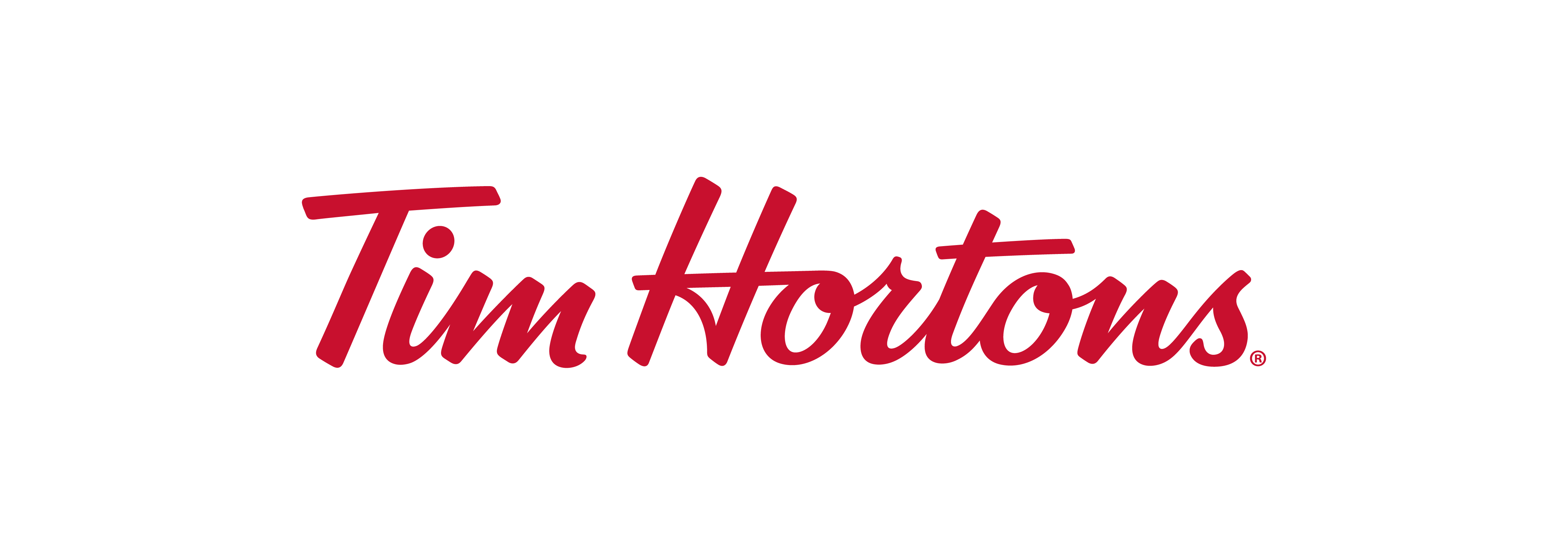 Toronto, Ontario, Canada, 2020. Hand holding Tim Hortons coffee mug in from  of the store. Tim