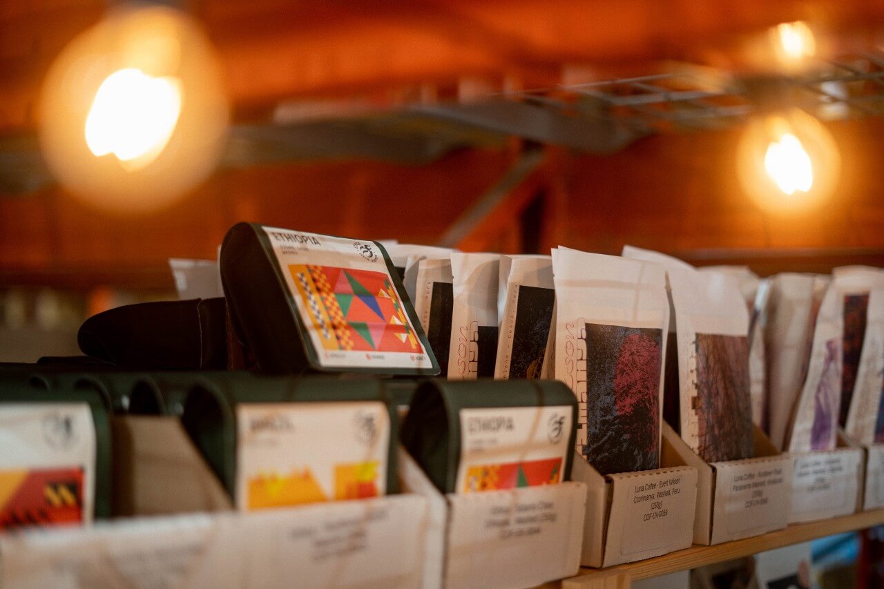 Bags of coffee on a shelf