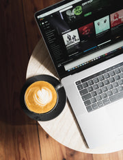 Photo of coffee and laptop by Thomas Hetzler on Unsplash