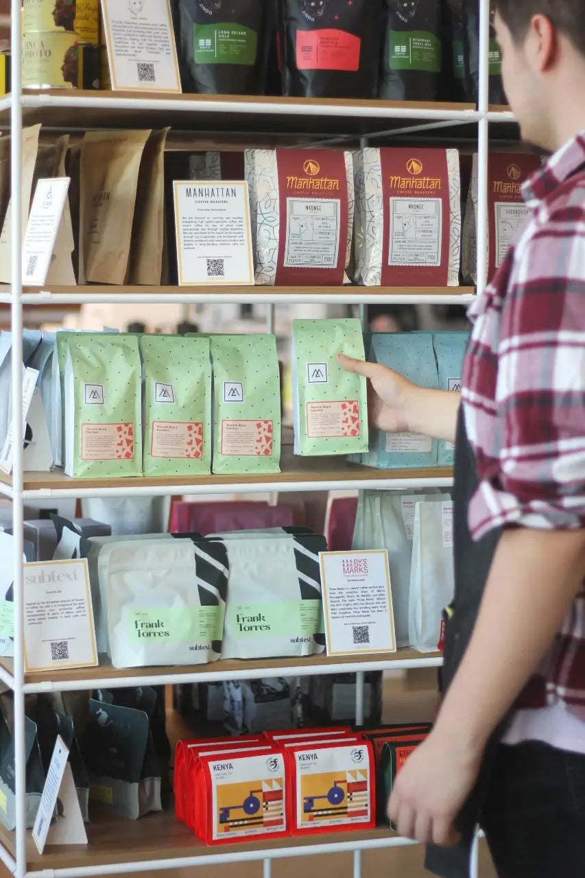 Bags of coffee beans on a shelf