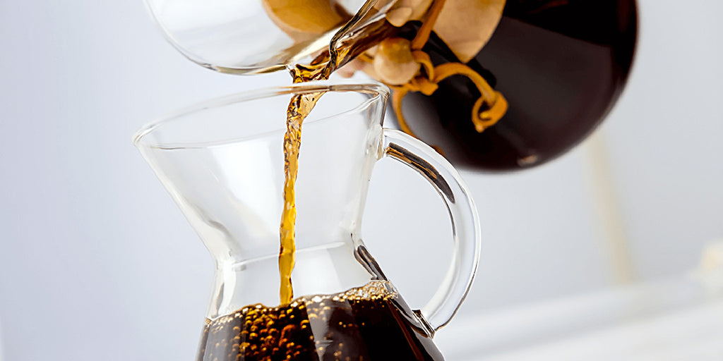 https://eightouncecoffee.ca/cdn/shop/collections/chemex-glass-mug-pour_1.jpg?v=1603296860&width=1024