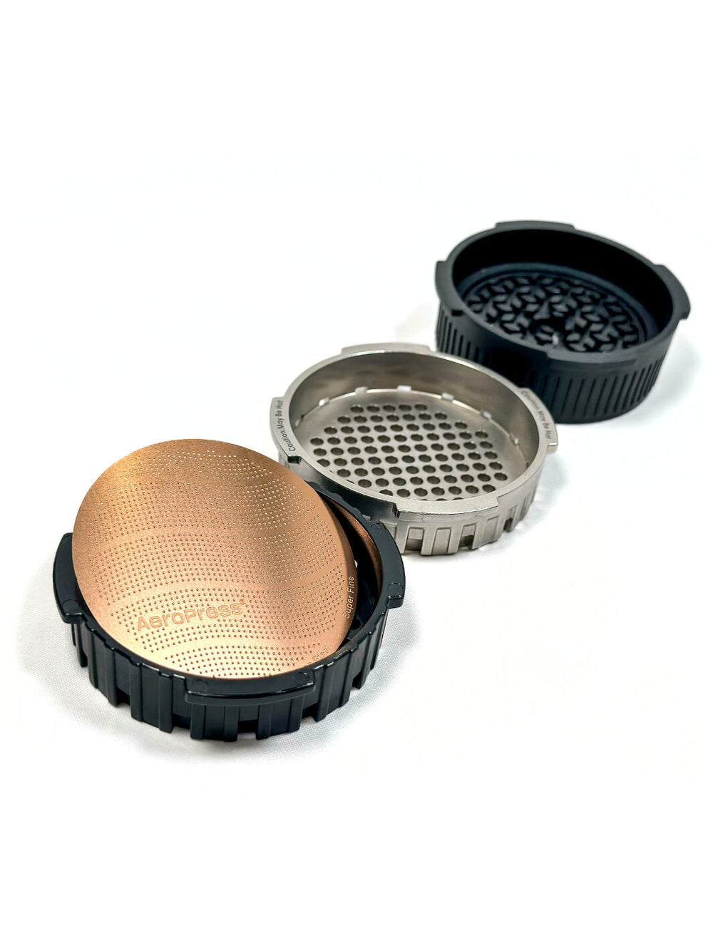 Photo of AeroPress Gold Tone Reusable Filter (titanium-coated) ( ) [ AeroPress ] [ Metal Filters ]